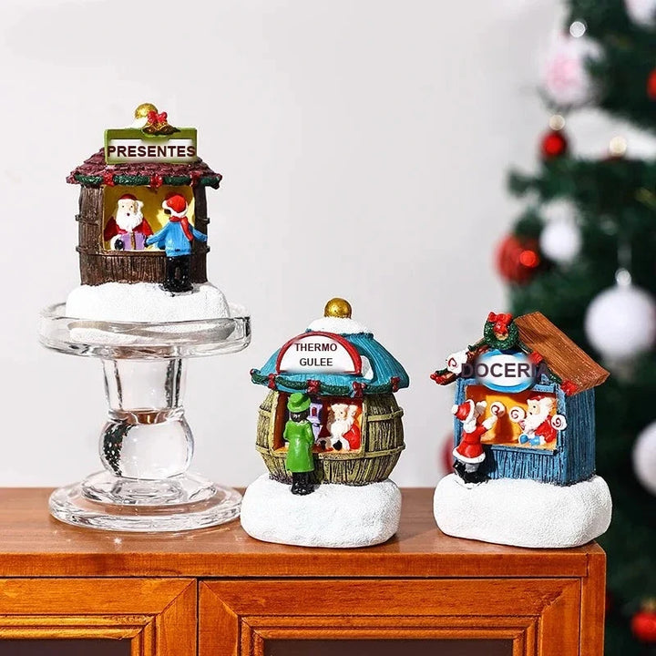 miniaturas natalinas em resina decorando aparador de madeira