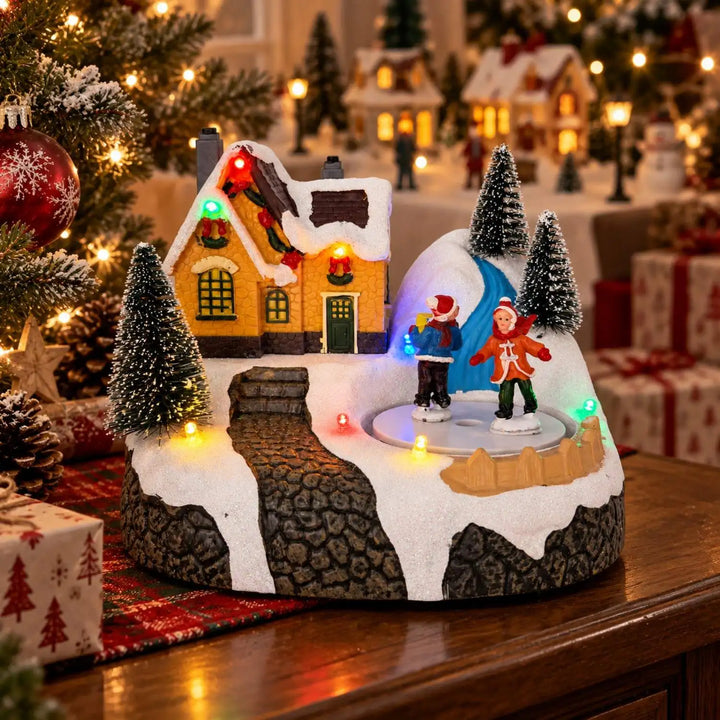casinha de natal com led sobre aparador de madeira