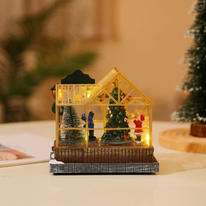 lateral da estufa de natal iluminada com árvore enfeitada