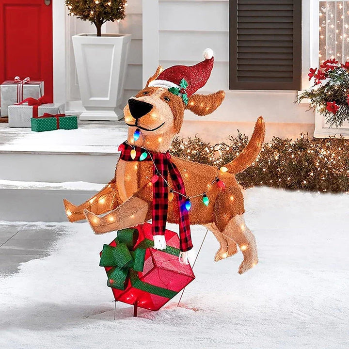 cachorro de natal iluminado com presente no jardim