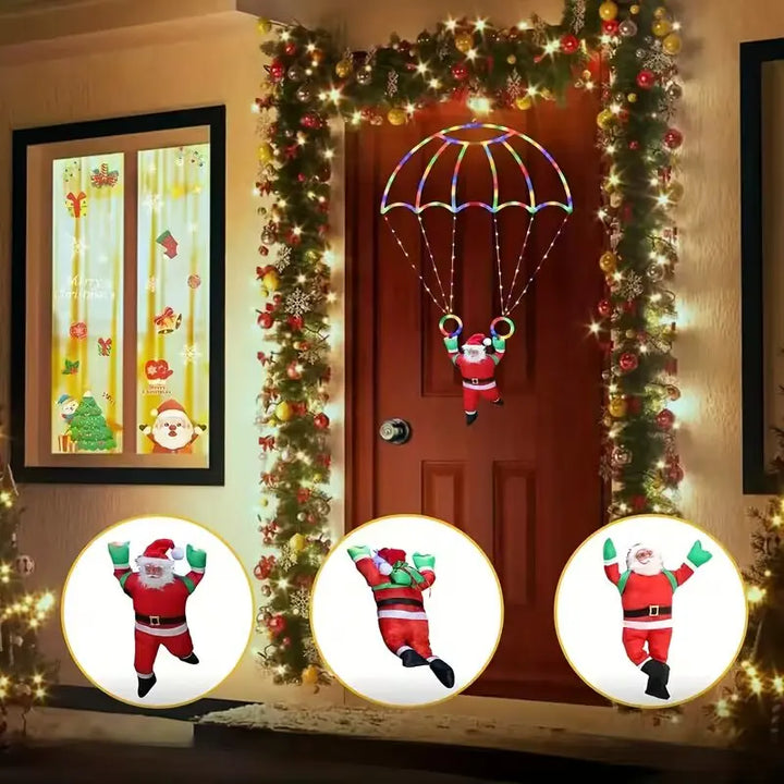 enfeite de natal papai noel de paraquedas na porta decorada