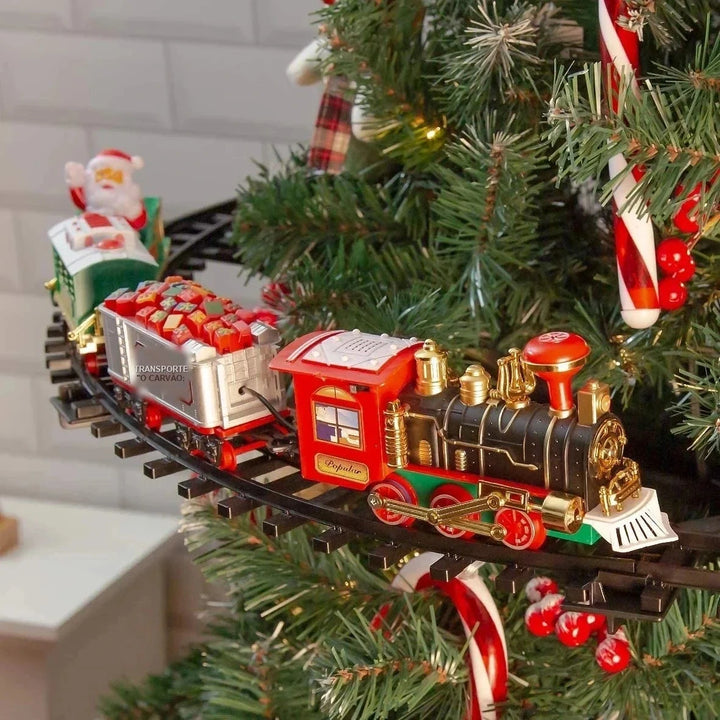 trenzinho de natal com locomotiva vermelha e vagões de presentes na árvore