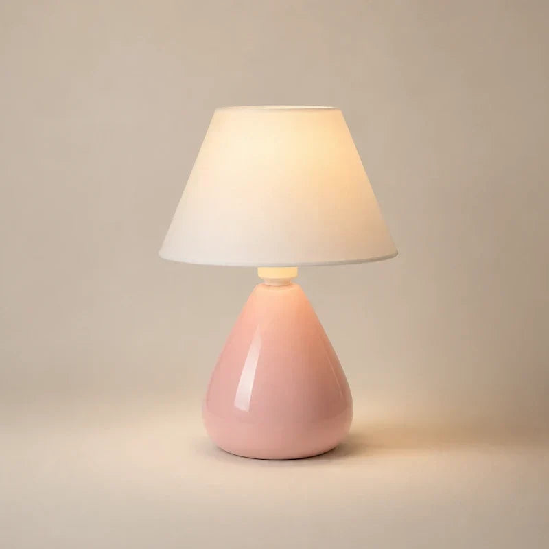 abajur de cerâmica rosa claro com cúpula branca