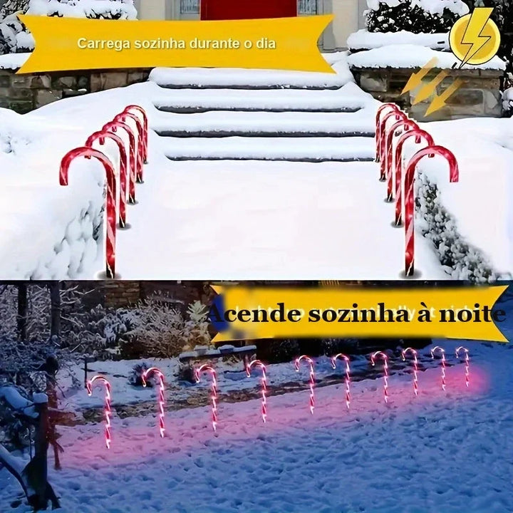 bengala de natal solar carrega de dia e acende à noite no caminho
