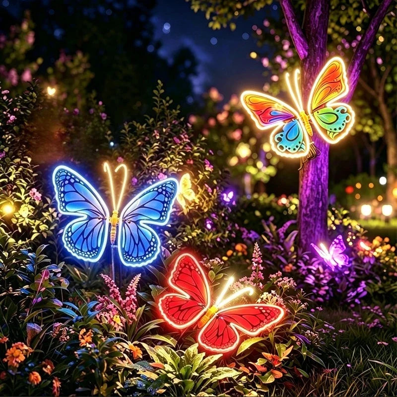 borboletas led coloridas iluminando o jardim à noite