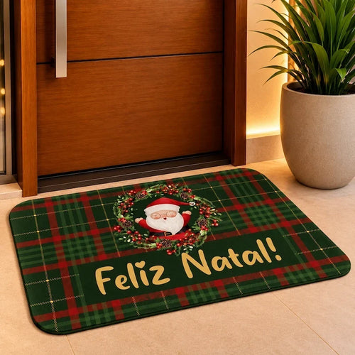 capacho de natal na porta de entrada com planta