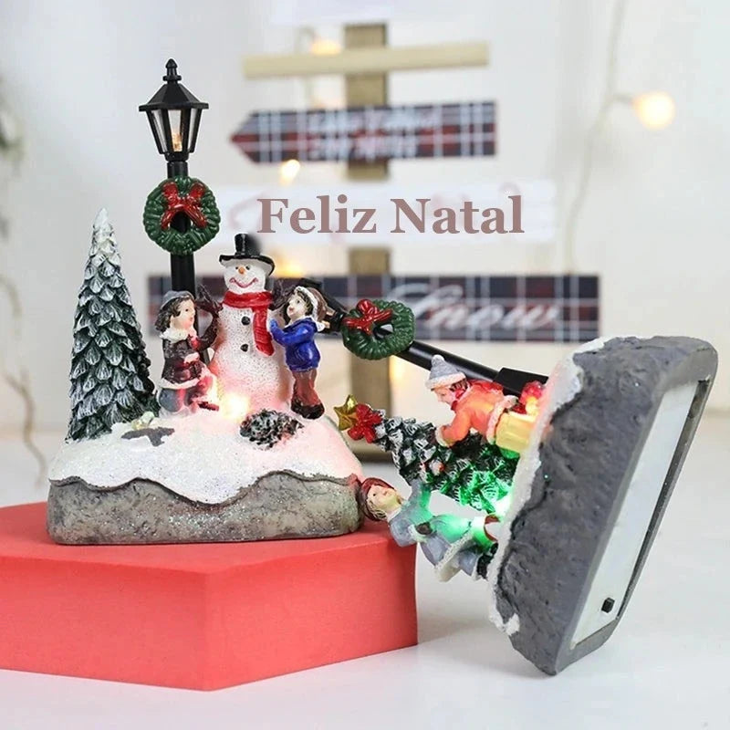 miniatura de natal iluminada com poste e pinheiro nevado
