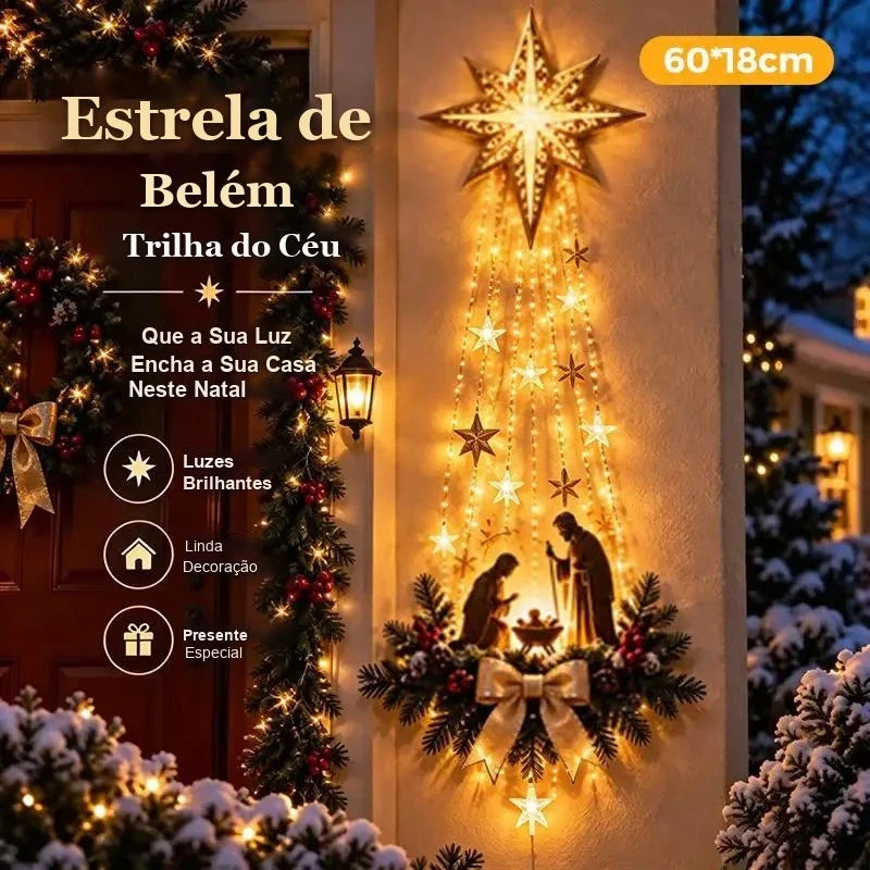 luz de parede de natal estrela de belem com presepio na entrada