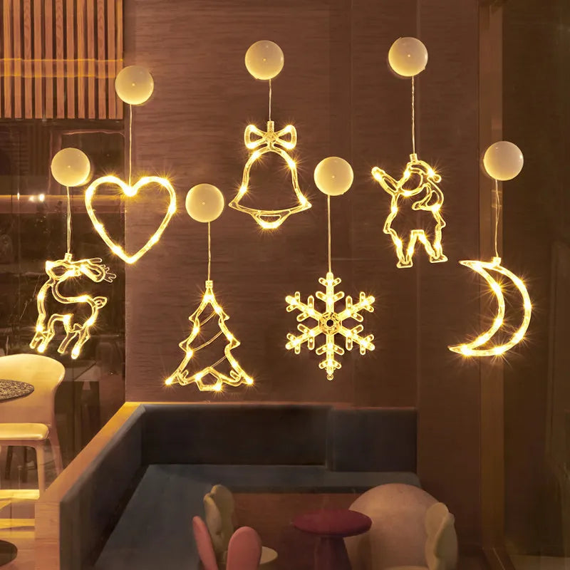 enfeites de natal com ventosa coracao lua sino e floco de neve iluminados