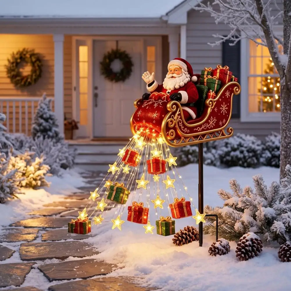 estaca de natal trenó do papai noel iluminando caminho de entrada da casa