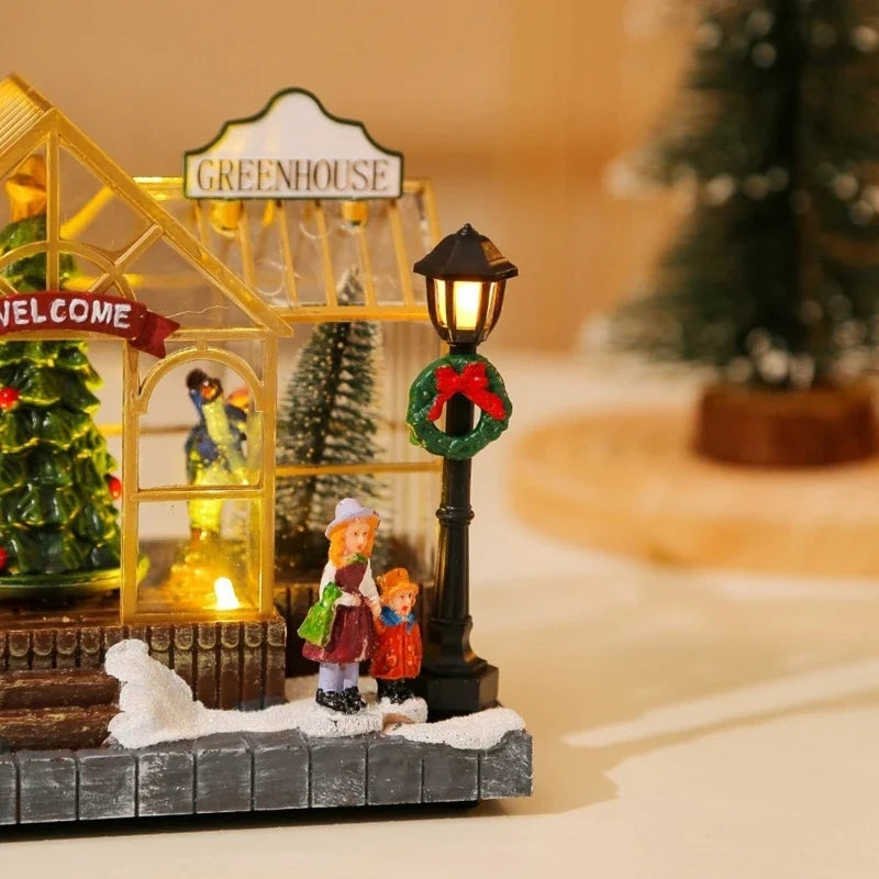 detalhe da estufa de natal com família e poste com guirlanda