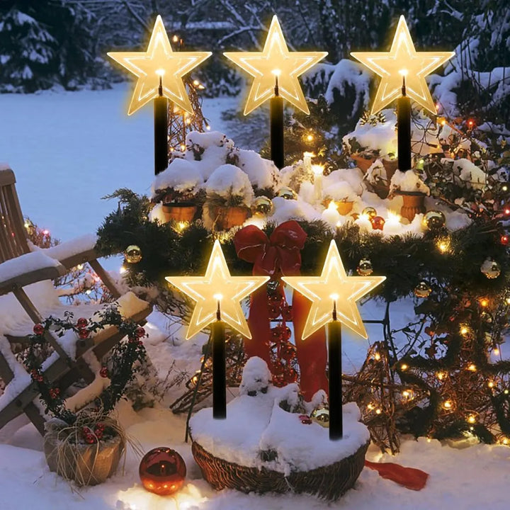 estacas solares de natal formato estrela decorando jardim