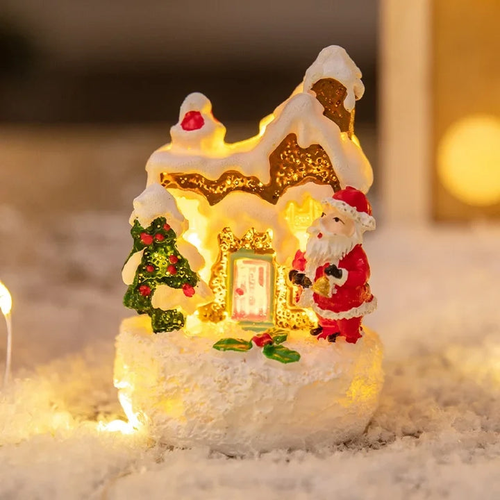 casa de biscoito iluminada com papai noel em resina