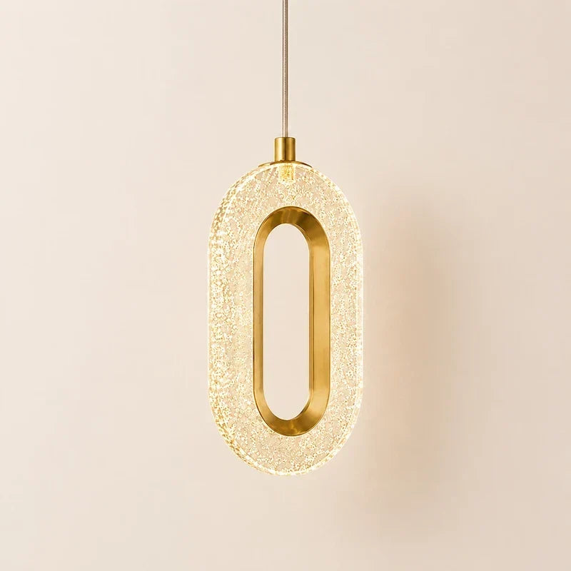luminária pendente dourada com acrílico transparente efeito bolhas